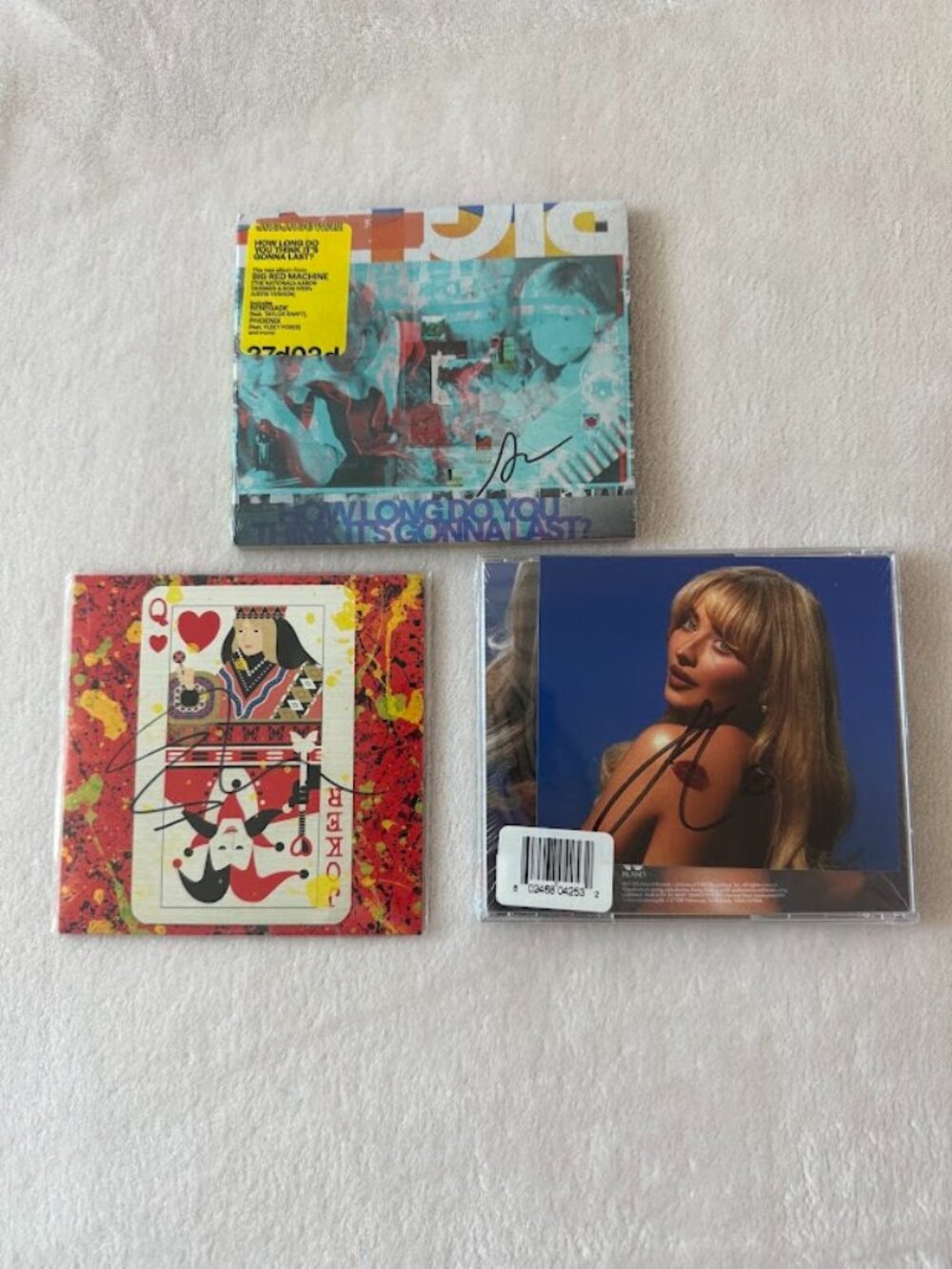 Signed CD lot: Sabrina Carpenter, Ed Sheeran, Aaron Dessner